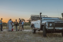 Safari vehicle bush sunset 