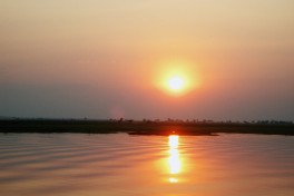 Sunset over the Chobe River  by Paul Makinen